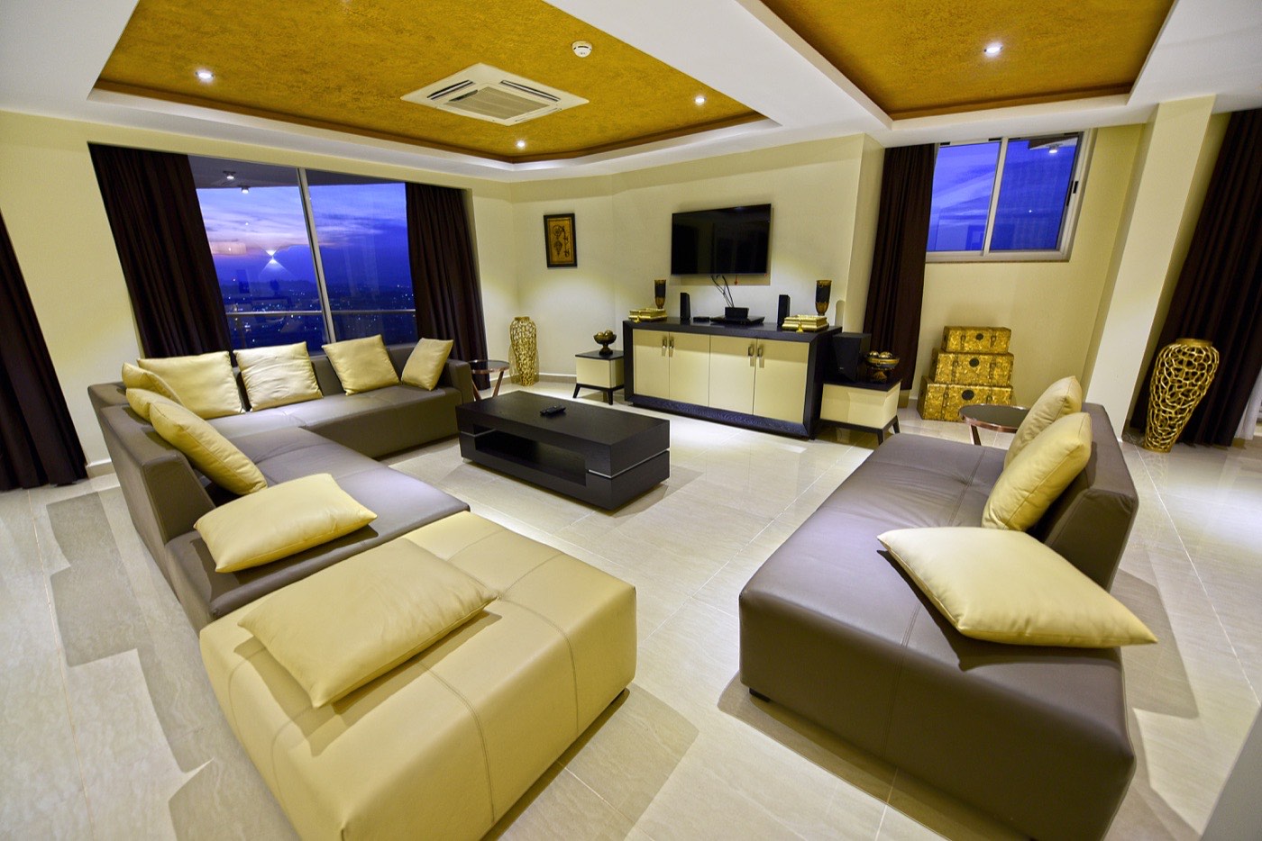 Presidential Suite living room with skyline windows